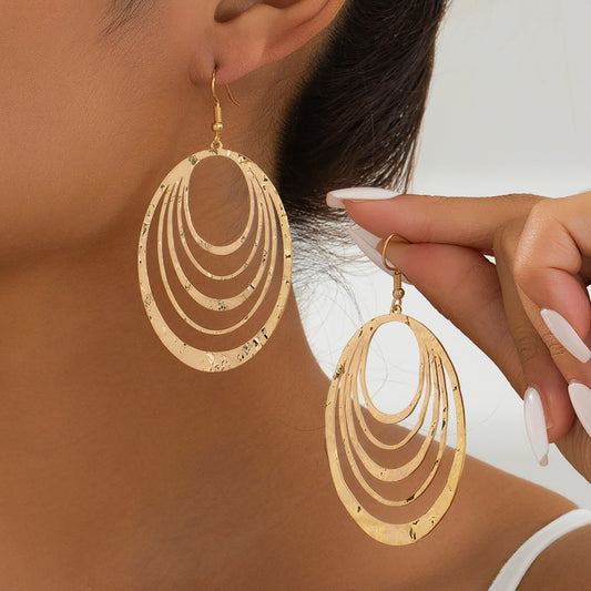 Boucles d’oreilles pendantes dorées