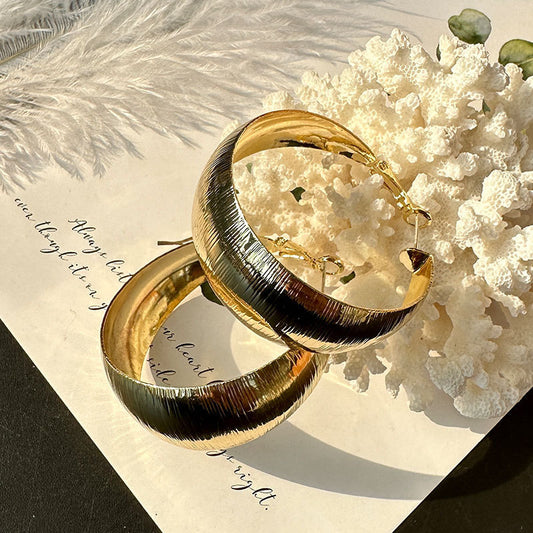 Boucles d’oreilles audacieuses