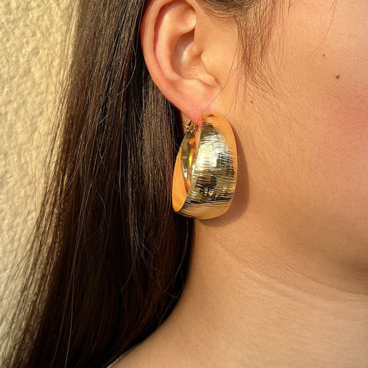 Boucles d’oreilles audacieuses