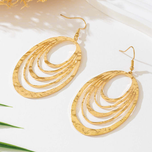 Boucles d’oreilles pendantes dorées